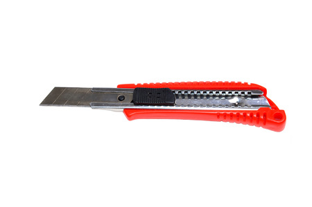 Red knife cutter isolated on white backgroundの写真素材