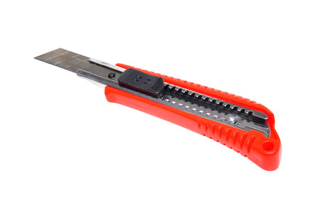 Red knife cutter isolated on white backgroundの写真素材