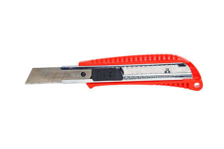Red knife cutter isolated on white backgroundの写真素材