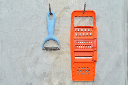 plastic grater was hanging on the wall in the kitchen.の写真素材