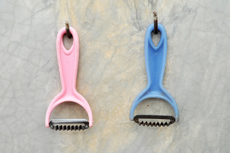 plastic grater was hanging on the wall in the kitchen.の写真素材