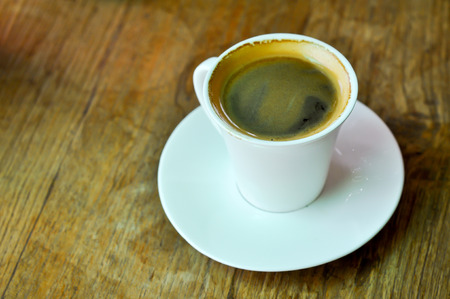 A cup of americano coffee on the table.の写真素材