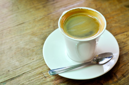 A cup of americano coffee on the table.の写真素材
