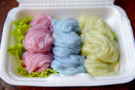 Thai steamed rice-skin dumplings made with rice flour smear on the cloth stretched mouth boiling cauldron. A filling made with shrimp or pork.の写真素材