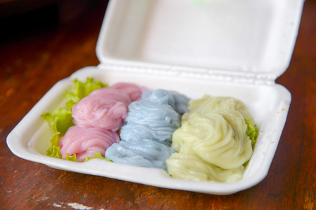 Thai steamed rice-skin dumplings made with rice flour smear on the cloth stretched mouth boiling cauldron. A filling made with shrimp or pork.の写真素材