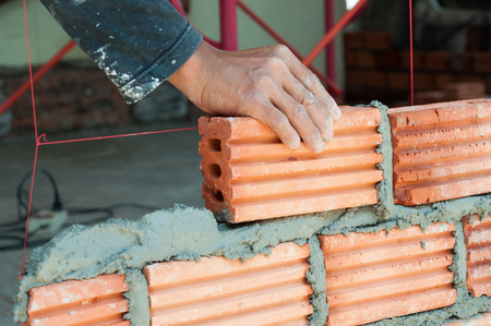 The brickworkers are brick for use as a building wall.の写真素材