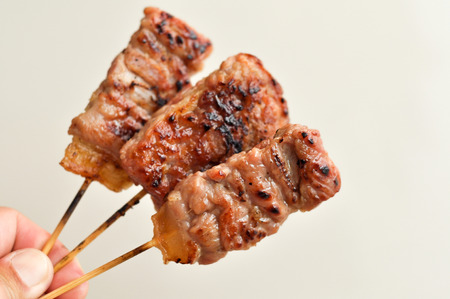 Roasted  Pork with bamboo stickの写真素材