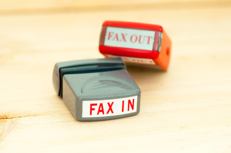 Fax in Fax out rubber stamperの写真素材