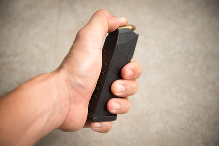 handloading 9mm bullets into the gun magazine