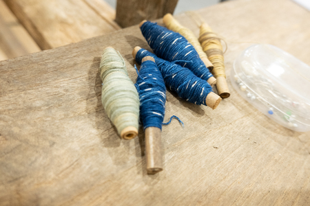 Yarn made from cotton that is dyed with natural colors.の写真素材