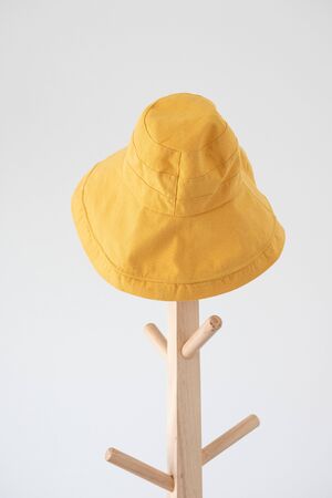 Wide brimmed sun hat on the coat rackの写真素材
