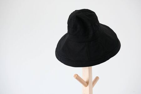 Wide brimmed sun hat on the coat rackの写真素材