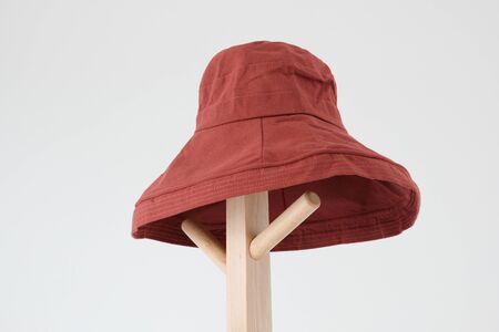 Wide brimmed sun hat on the coat rackの写真素材