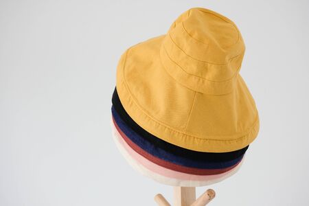 Wide brimmed sun hat on the coat rackの写真素材