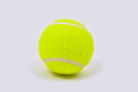 The tennis ball needs to be flashy in order to be able to see it easily.の写真素材