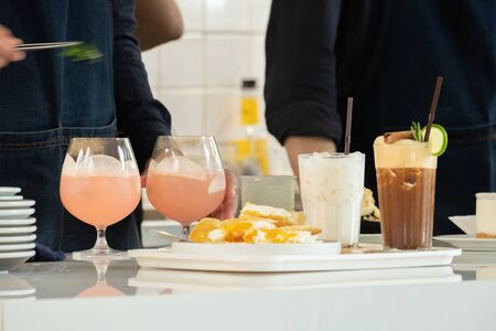 Beverage ordered by customers on the bar waiting to be served to customers