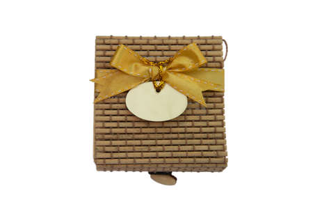 bamboo gift box with gold ribbon and tagの写真素材