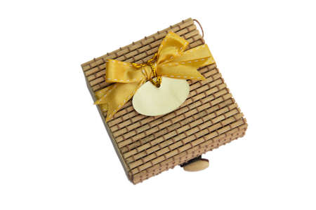 bamboo gift box with gold ribbon and tagの写真素材