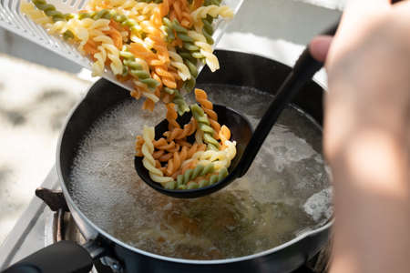 Ingredient and step by step to cooked vegetable rotini pasta soup with pork and carrot