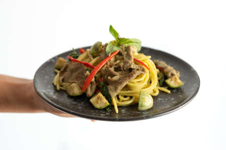 Green Curry Pork Spaghetti, Fusion food between Thai and Italian ingredientsの写真素材