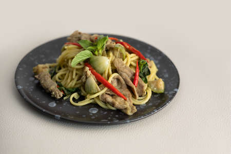 Green Curry Pork Spaghetti, Fusion food between Thai and Italian ingredientsの写真素材