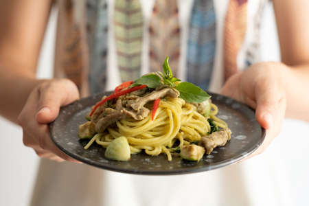 Green Curry Pork Spaghetti, Fusion food between Thai and Italian ingredientsの写真素材