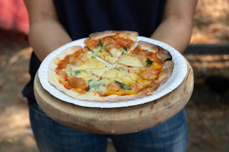 Homemade classic italian pizza. Chef makes homemade pizza on the holidays.の写真素材