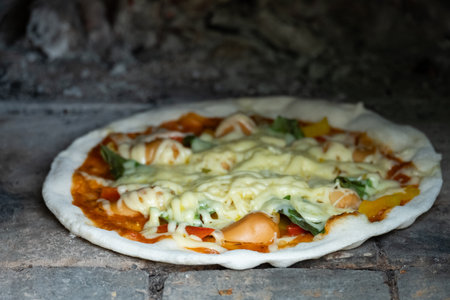 Homemade classic italian pizza. Chef makes homemade pizza on the holidays.の写真素材