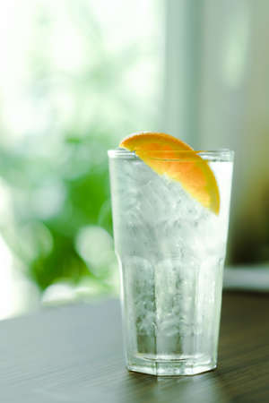 Refreshing water with ice and orangeの写真素材