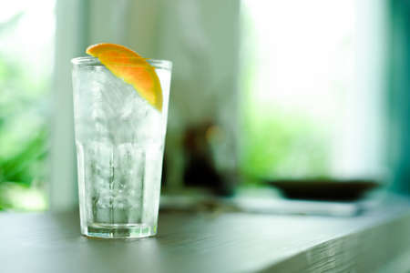 Refreshing water with ice and orangeの写真素材