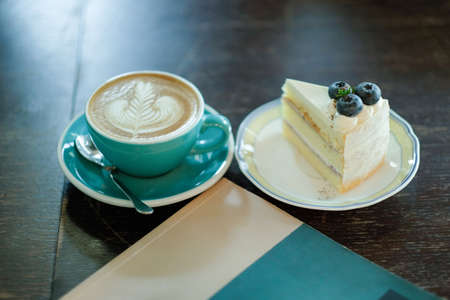 cappuccino and blueberry cheese cakeの写真素材