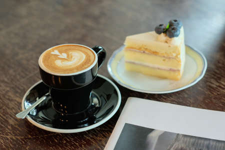 cappuccino and blueberry cheese cakeの写真素材