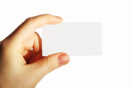 Paper card in hand, isolated on white backgroundの写真素材