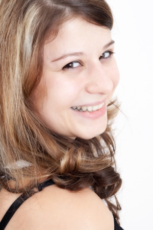 Portrait of a young brunette girl with brown eyesの写真素材