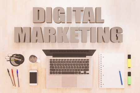 Digital Marketing - text concept with notebook computer, smartphone, notebook and pens on wooden desktop. 3D render illustration.の写真素材