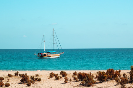 Sailing ship in the Mediterranean Sea. View from the beach.の写真素材