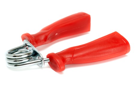Hand grippers with red handles isolated on white .の写真素材