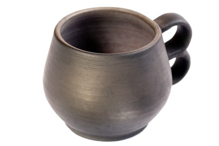 Pottery mug isolated on white.の写真素材