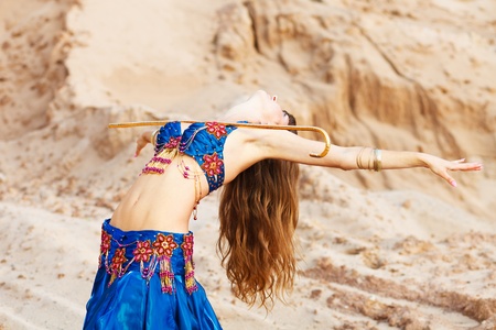 East belly dancer in blue lingerie.の写真素材