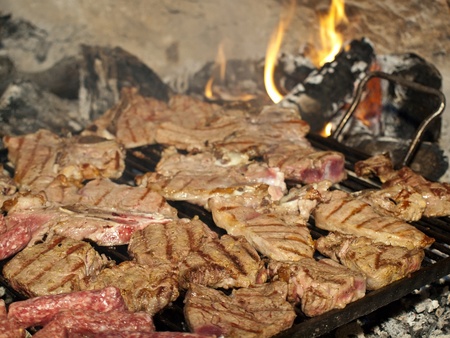 Barbecue with many parts of red meatの写真素材