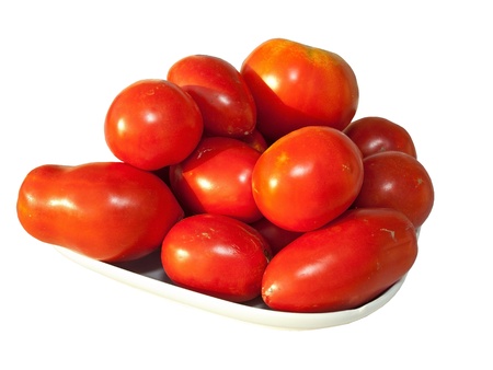 Red tomatoes isolated on white background close upの写真素材