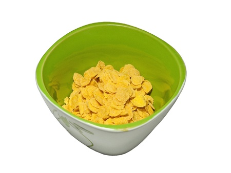 Corn flakes bowl isolated on white backgroundの写真素材