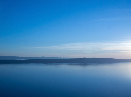 Calm blue sea and island Hvar in backgroundの写真素材