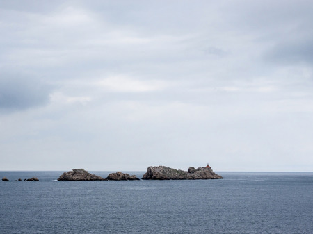 Rocky island with small lighthouse near Dubrovnik