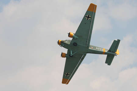 Comina, Italy - June 27, 2010: Junkers Ju 52 in flight at La Comina Air Show.のeditorial素材