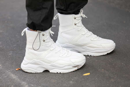 September 24, 2020: a model is wearing a pair of white high top sneakers