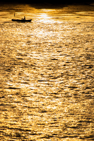 Boat at sunset in Nileの写真素材