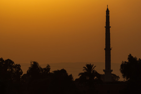 Silhouette of a mosque from Nile, Egyptの写真素材