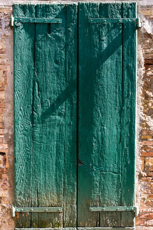 Ancient handmade door in Florence. Tuscany, Italyの写真素材