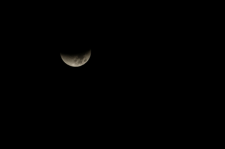 Florence, Italy - September 2015 -  Lunar eclipse before it becomes red. Italy, 2015